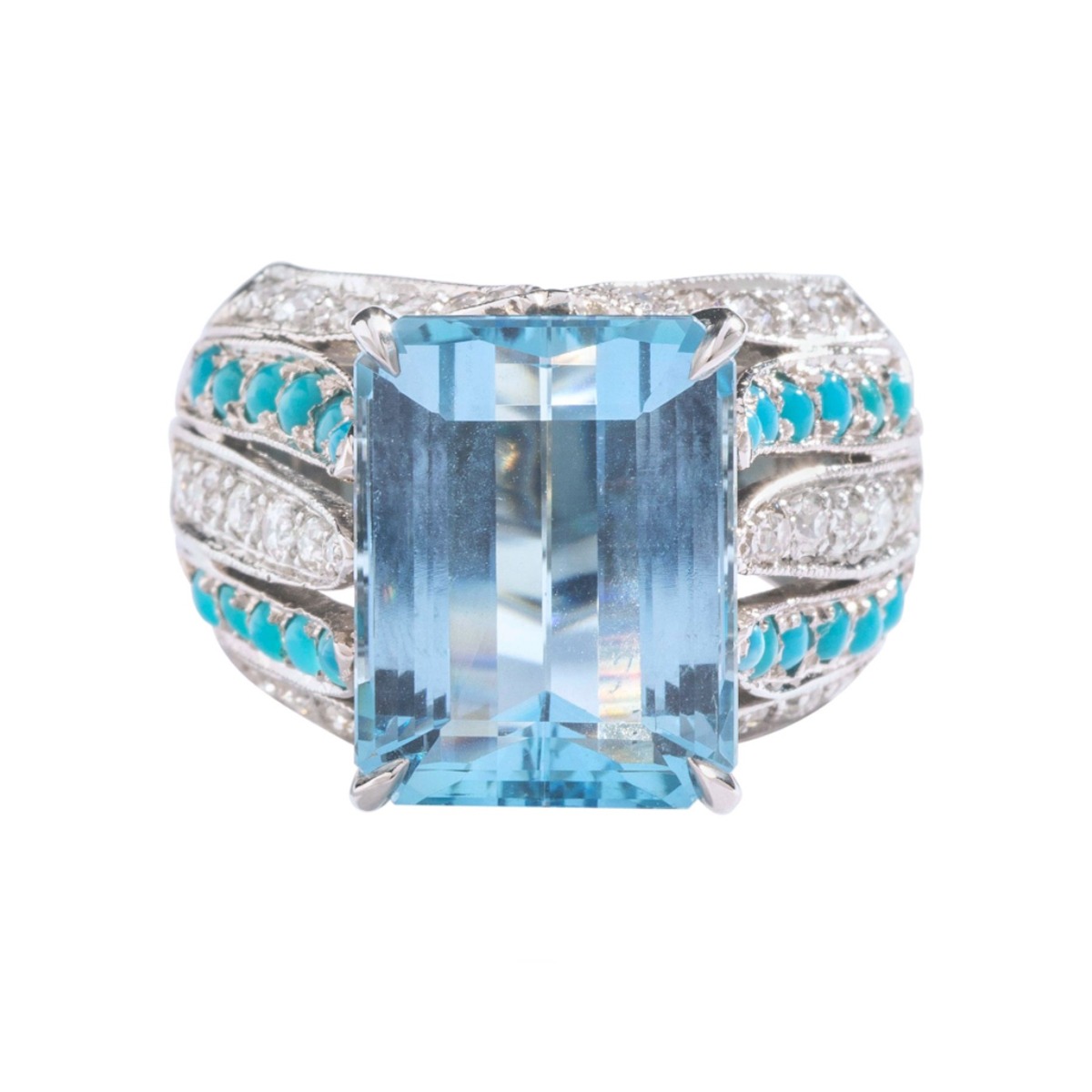 front view of the 9.75 carat Aquamarine centering a diamond and cabochon turquoise platinum ring.