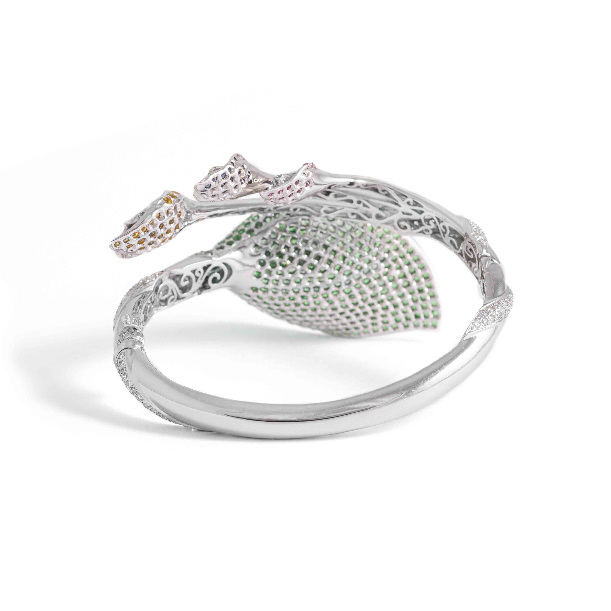 Bangle in 18kt white gold set with 301 diamonds 4.92 cts, 26 pink sapphires 0.53 cts, 343 green sapphires 7.12 cts and 36 sapphires 0.61 cts and 53 yellow sapphires 1.25 cts    