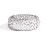 Bangle in 18kt white gold set with 554 diamonds 6.12 cts    Inner circumference: Approximately 15.70 centimeters ( 6.18 inches) Total weight: 111.52 grams. Width on the top: 2.50 centimeters ( 0.98 inches).