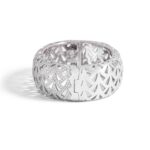 Bangle in 18kt white gold set with 554 diamonds 6.12 cts    Inner circumference: Approximately 15.70 centimeters ( 6.18 inches) Total weight: 111.52 grams. Width on the top: 2.50 centimeters ( 0.98 inches).