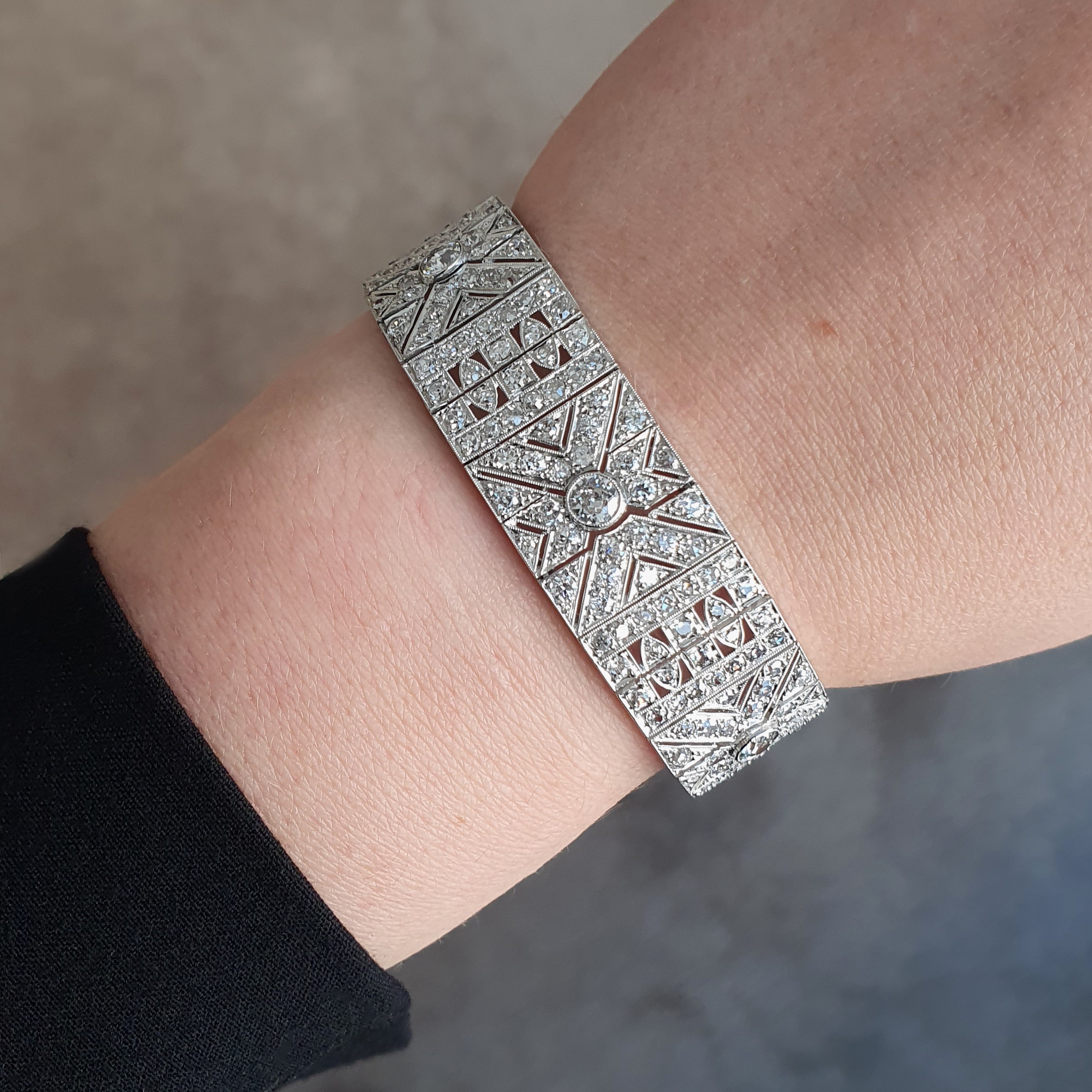 The bracelet is worn on the hand and shows the front of the French Art Deco, Diamond and Platinum Bracelet. Very beautiful and elegant Art Deco design.