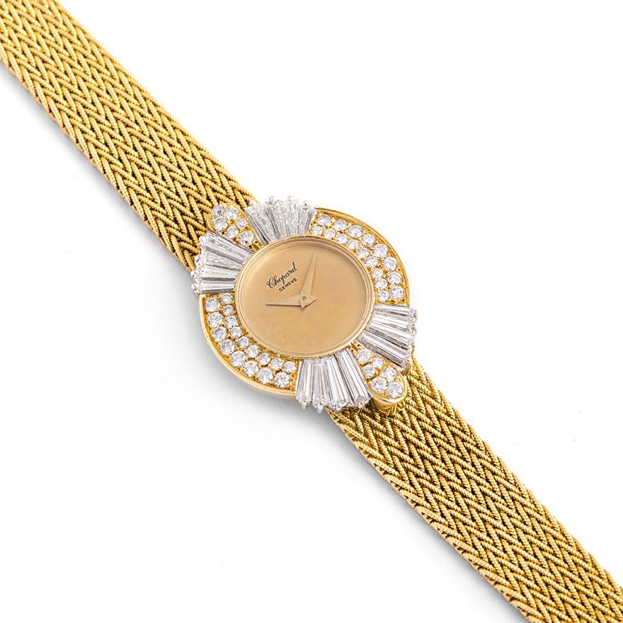 Front view and close-up from the Chopard Diamond Yellow Gold 18K Wristwatch. Pave set by round cut and baguette-cut diamonds.