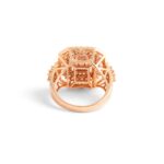 Diamond Pink Gold Ring. The center stage is adorned with 36 baguette-cut diamonds, totaling an impressive 1.47 carats.Surrounding the baguette-cut diamonds are 100 additional diamonds, totaling 0.49 carats.