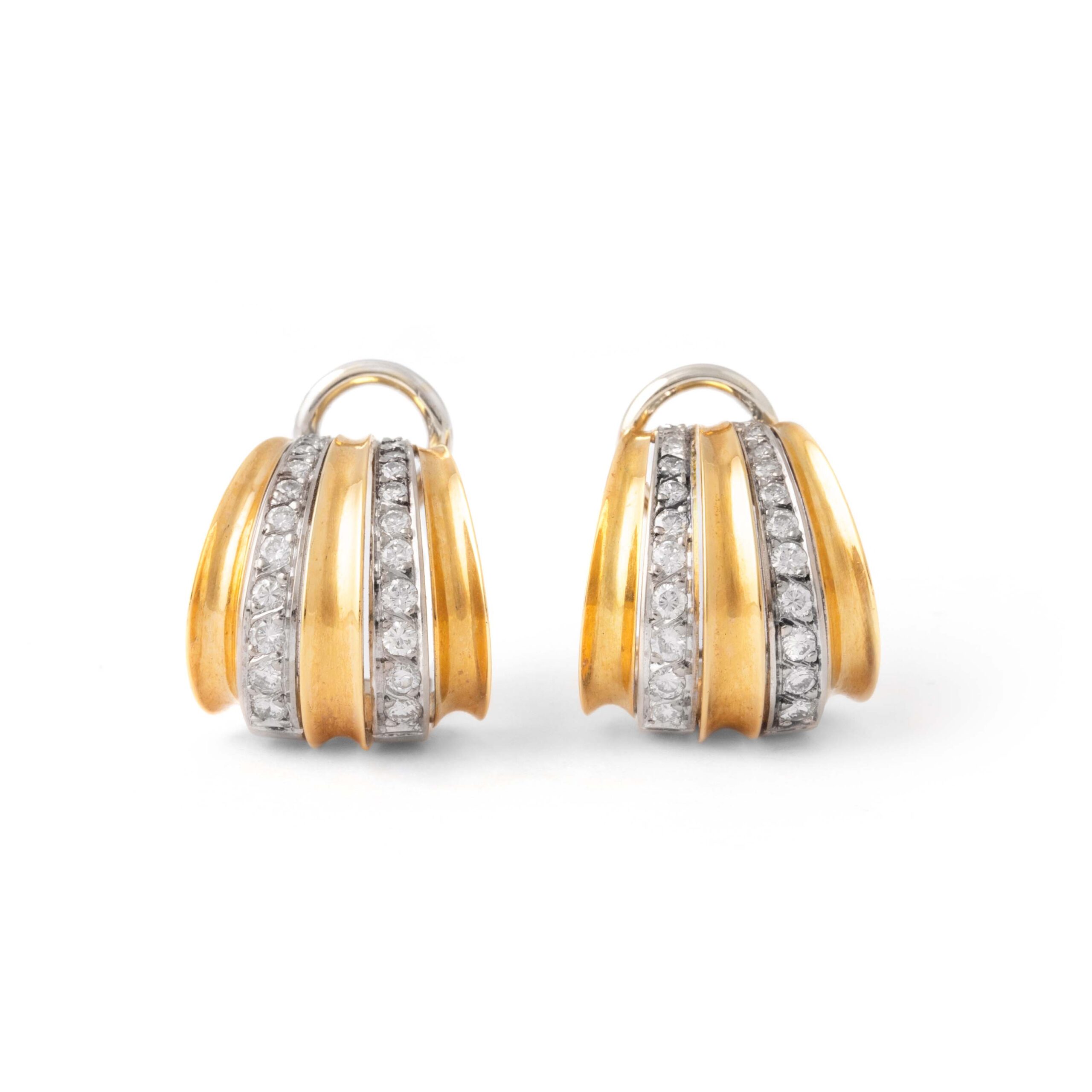Radiate elegance with these exquisite Diamond 18K Yellow and White Gold Earrings. Each earring features a stunning 0.78-carat diamond, boasting an H color and VS clarity. A harmonious blend of timeless luxury and impeccable craftsmanship.
