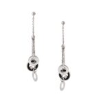 Diamond White Gold Earrings. 2 round cut diamond 0.06 carat. Total weight: 6.44 grams. Length: 6.20 centimeters. Width: 0.30 centimeters up to 1.10 centimeters.
