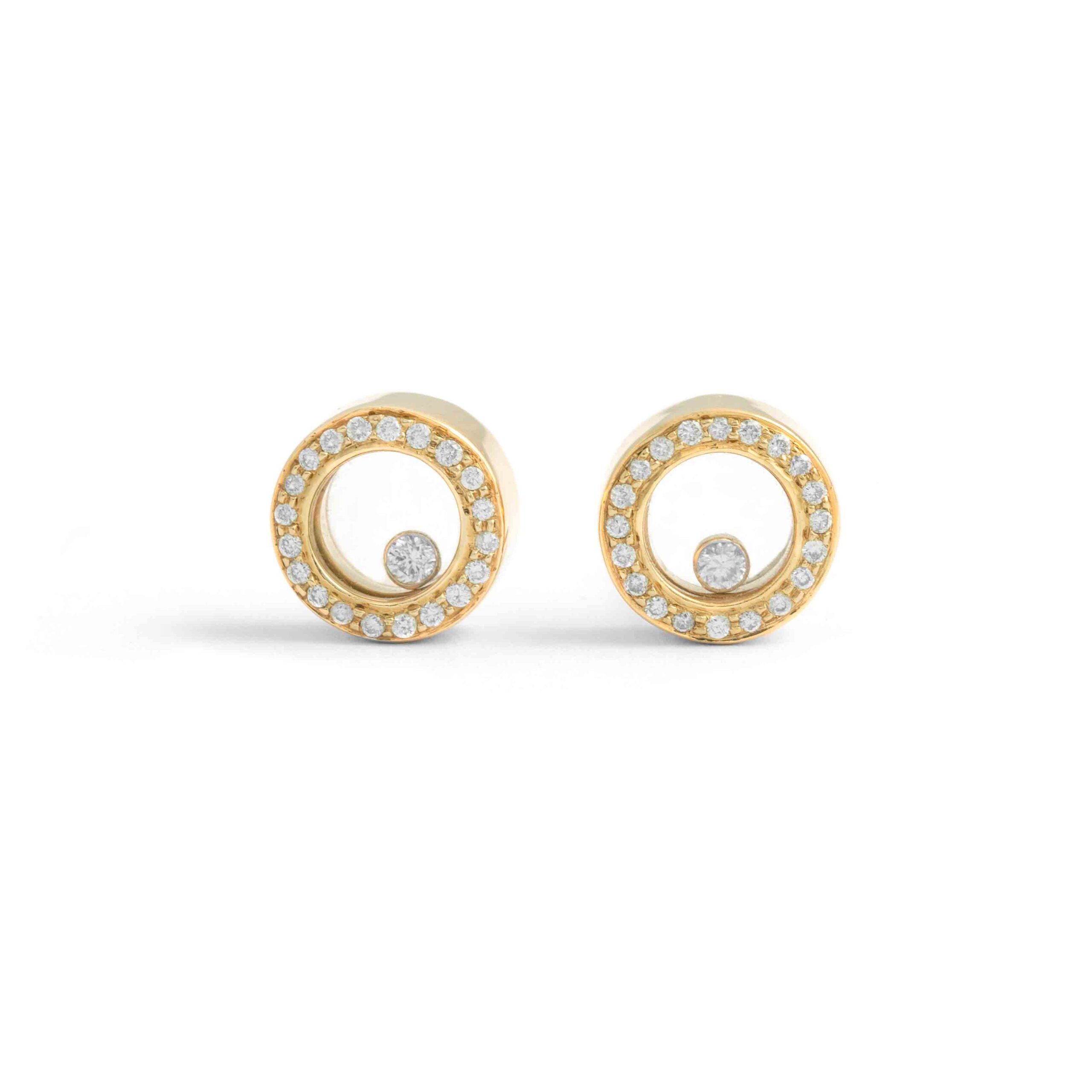 Dancing diamonds gently moving and twirling between two crystals. Diamond Yellow Gold 18K Earrings. Diameter: 1.00 centimeters. Total weight: 6.36 grams