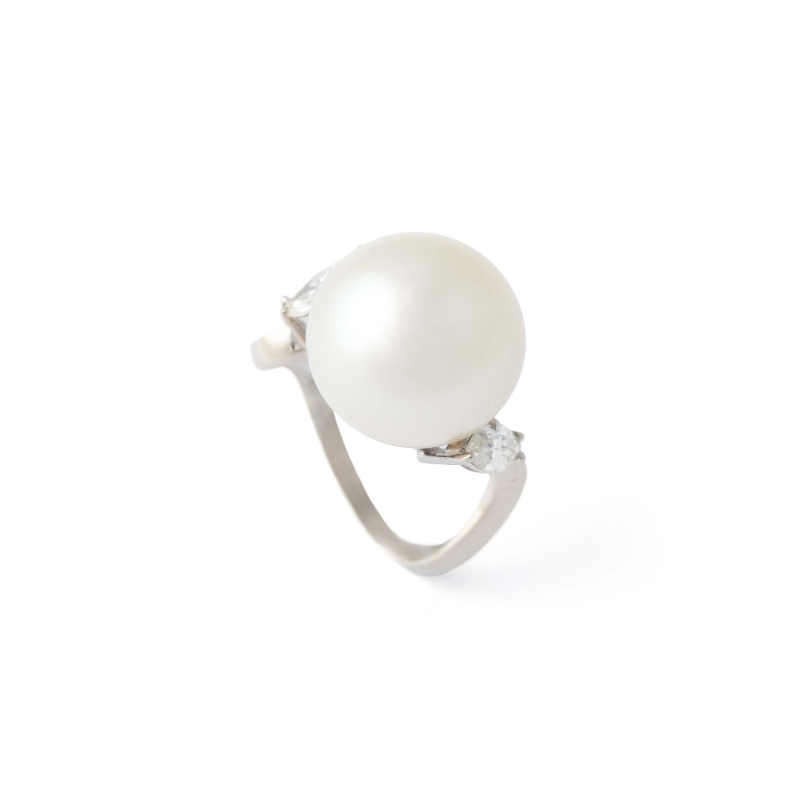 Front view Cultured Pearl Diamond White Gold Ring. Pearl dimensions: diameter 13,7 mm, 13,97 carats. Color white cream pinky. 2 Diamonds marquise cut 0,53 carat estimated E color, Clean.