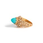 18K yellow gold ring set by rose-cut diamonds and centered by a cabochon turquoise. Early 20th Century. Ottoman work. Gross weight: 4.56 grams.