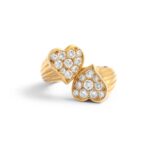 Diamond Yellow Gold 18K Two Hearts Crossover Ring. Height Heart motif: approx. 1.60 centimeters. Size: 47 Weight: 10.17 grams